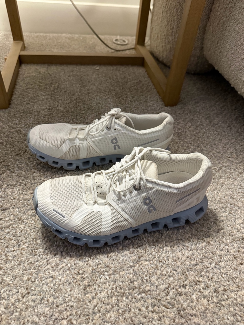 On Running Men’s Athletic Shoes in White with Light Blue Soles